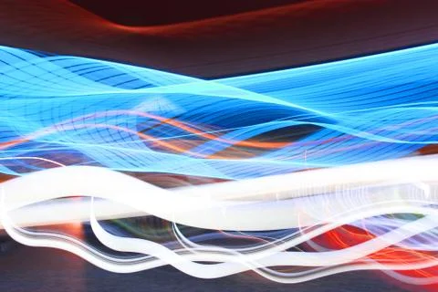 Psychedelic gradient bright red, orange, yellow colors on a dark background Stock Photos