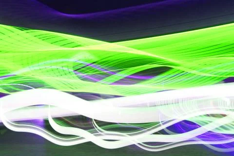 Psychedelic gradient bright red, orange, yellow colors on a dark background Stock Photos