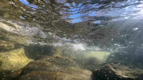 Psychedelic hypnotic underwater shot of a shallow stream in Saaremaa, Video stock 292275454