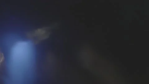 Psychedelic light leaks pulses and glows in the dark. Motion abstract flare. Stock Footage 237997842