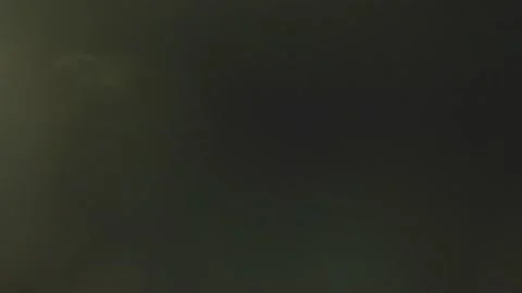 Psychedelic light leaks pulses and glows in the dark. Motion abstract flare. Stock Footage 237997979