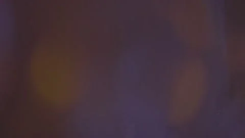 Psychedelic light leaks pulses and glows in the dark. Motion abstract flare. Stock Footage 237998258