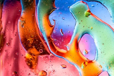 Psychedelic Multi Colored Oil Smears and Water Droplets Stock Illustration