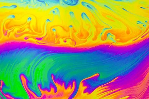Psychedelic multicolor patterns background. Photo macro shot of soap bubbles 写真素材