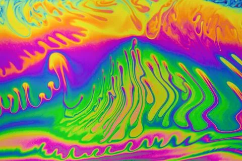 Psychedelic multicolor patterns background. Photo macro shot of soap bubbles 写真素材