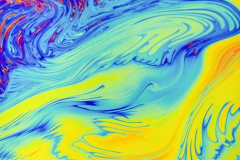 Psychedelic multicolor patterns background. Photo macro shot of soap bubbles 写真素材