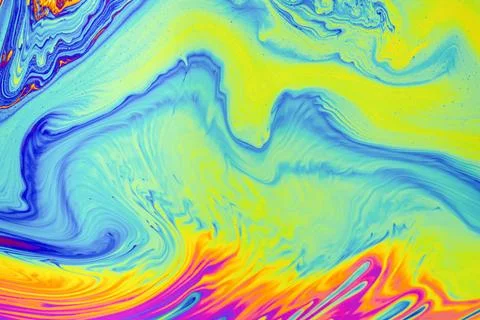 Psychedelic multicolor patterns background. Photo macro shot of soap bubbles 写真素材