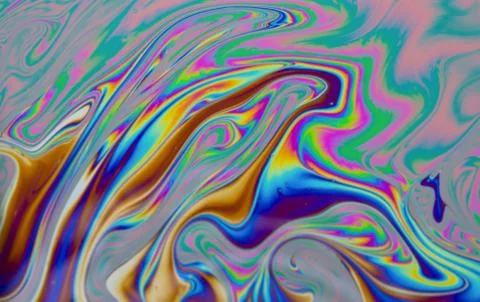 Psychedelic multicolored patterns background. Photo macro shot of soap bubble Stock Photos