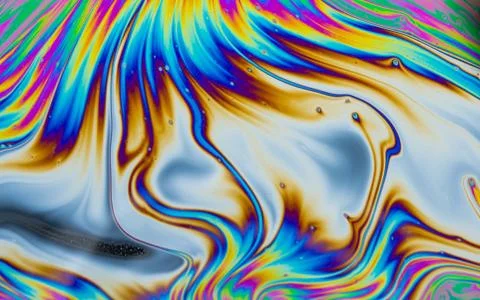 Psychedelic multicolored patterns background. Photo macro shot of soap bubble Stock Photos