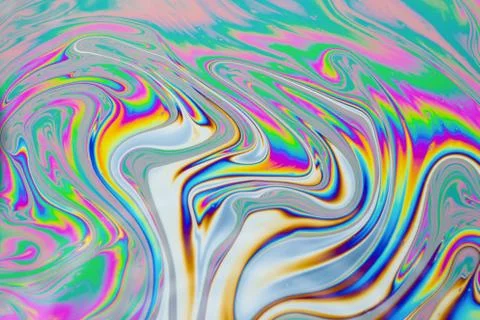 Psychedelic multicolored patterns background. Photo macro shot of soap bubble Stock Photos