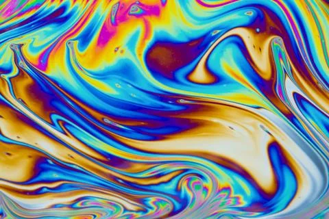 Psychedelic multicolored patterns background. Photo macro shot of soap bubble Stock Photos