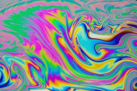 Psychedelic multicolored patterns background. Photo macro shot of soap bubble Stock Photos
