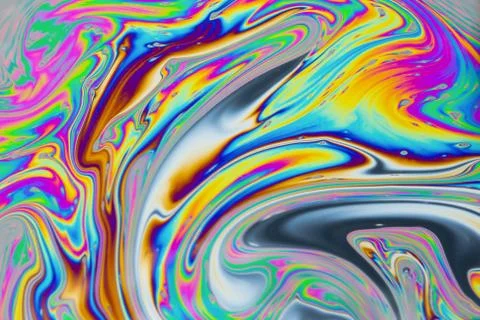 Psychedelic multicolored patterns background. Photo macro shot of soap bubble Stock Photos