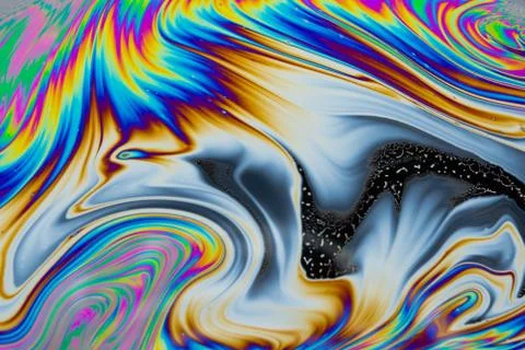 Psychedelic multicolored patterns background. Photo macro shot of soap bubble Stock Photos