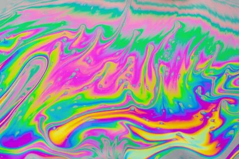 Psychedelic multicolored patterns background. Photo macro shot of soap bubble Stock Photos