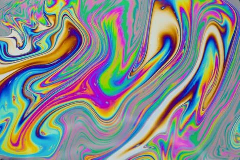 Psychedelic multicolored patterns background. Photo macro shot of soap bubble Stock Photos