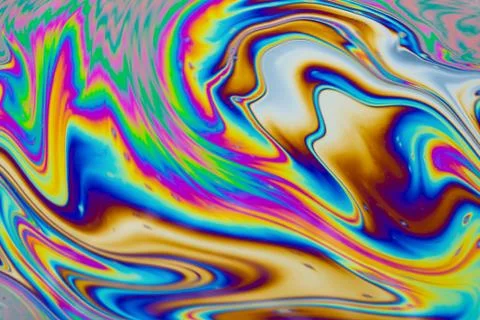 Psychedelic multicolored patterns background. Photo macro shot of soap bubble Stock Photos