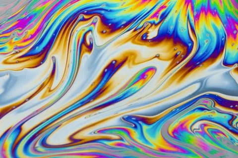 Psychedelic multicolored patterns background. Photo macro shot of soap bubble Stock Photos