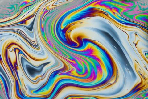 Psychedelic multicolored patterns background. Photo macro shot of soap bubble Stock Photos