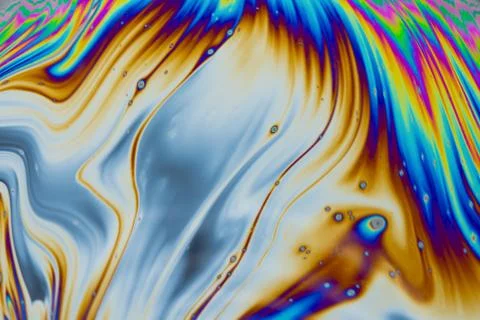 Psychedelic multicolored patterns background. Photo macro shot of soap bubble Stock Photos