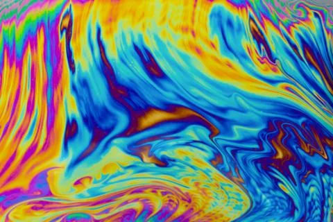 Psychedelic multicolored patterns background. Photo macro shot of soap bubble Stock Photos