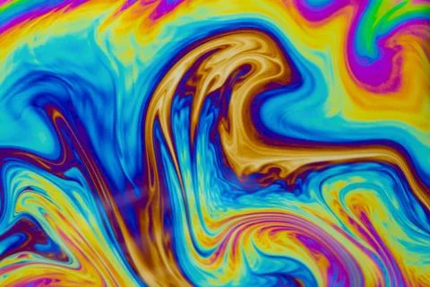 Psychedelic multicolored patterns background. Photo macro shot of soap bubble Stock Photos