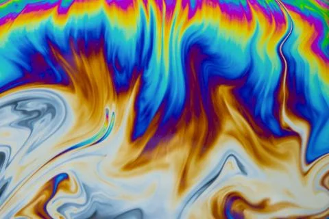 Psychedelic multicolored patterns background. Photo macro shot of soap bubble Stock Photos
