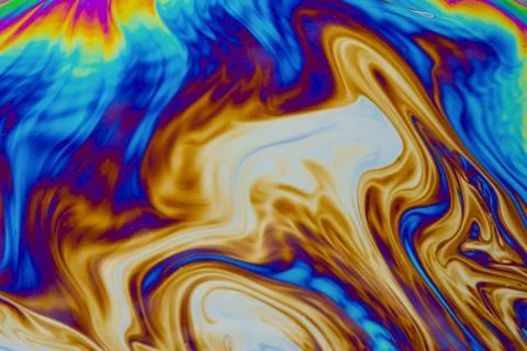 Psychedelic multicolored patterns background. Photo macro shot of soap bubble Stock Photos