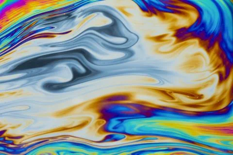 Psychedelic multicolored patterns background. Photo macro shot of soap bubble Stock Photos