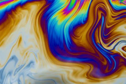 Psychedelic multicolored patterns background. Photo macro shot of soap bubble Stock Photos