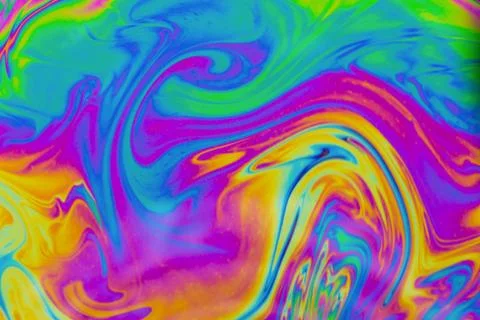 Psychedelic multicolored patterns background. Photo macro shot of soap bubble Stock Photos