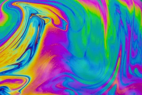 Psychedelic multicolored patterns background. Photo macro shot of soap bubble Stock Photos