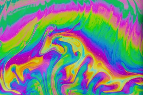 Psychedelic multicolored patterns background. Photo macro shot of soap bubble Stock Photos