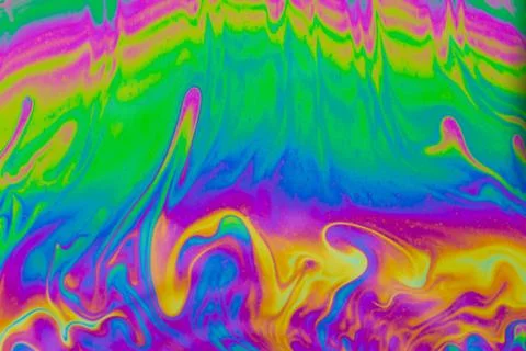 Psychedelic multicolored patterns background. Photo macro shot of soap bubble Stock Photos