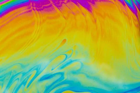 Psychedelic multicolored patterns background. Photo macro shot of soap bubble Stock Photos