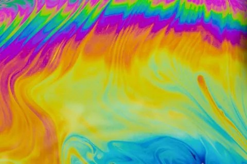 Psychedelic multicolored patterns background. Photo macro shot of soap bubble Stock Photos