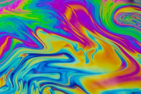 Psychedelic multicolored patterns background. Photo macro shot of soap bubble Stock Photos