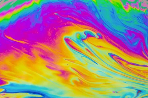 Psychedelic multicolored patterns background. Photo macro shot of soap bubble Stock Photos