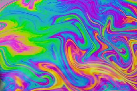 Psychedelic multicolored patterns background. Photo macro shot of soap bubble Stock Photos