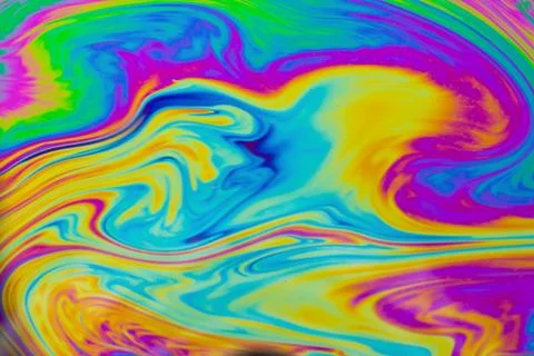 Psychedelic multicolored patterns background. Photo macro shot of soap bubble Stock Photos