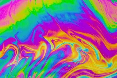 Psychedelic multicolored patterns background. Photo macro shot of soap bubble Stock Photos