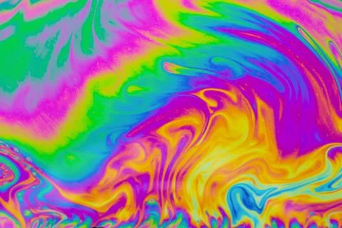 Psychedelic multicolored patterns background. Photo macro shot of soap bubble Stock Photos