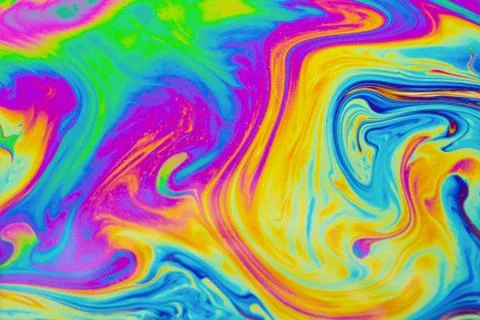 Psychedelic multicolored patterns background. Photo macro shot of soap bubble Stock Photos