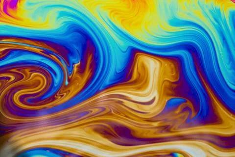 Psychedelic multicolored patterns background. Photo macro shot of soap bubble Stock Photos