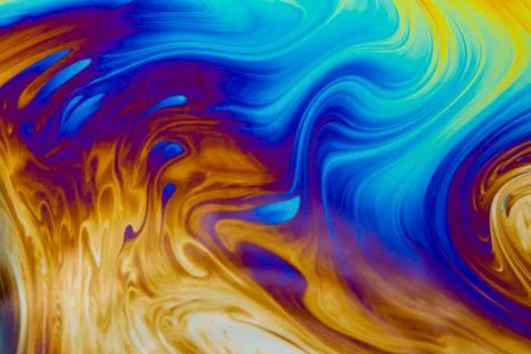 Psychedelic multicolored patterns background. Photo macro shot of soap bubble Stock Photos