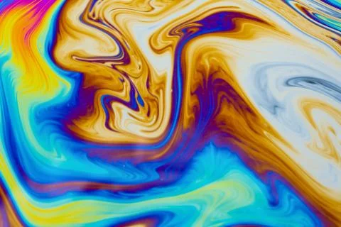Psychedelic multicolored patterns background. Photo macro shot of soap bubble Stock Photos