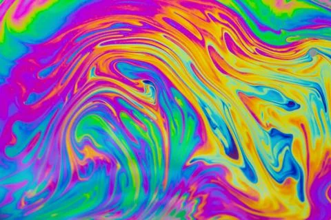 Psychedelic multicolored patterns background. Photo macro shot of soap bubble Stock Photos