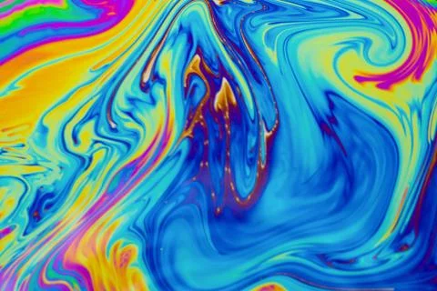 Psychedelic multicolored patterns background. Photo macro shot of soap bubble Stock Photos