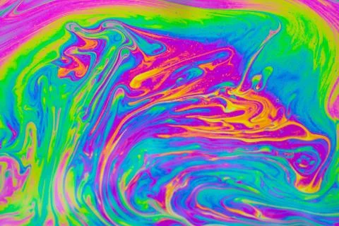 Psychedelic multicolored patterns background. Photo macro shot of soap bubble Stock Photos
