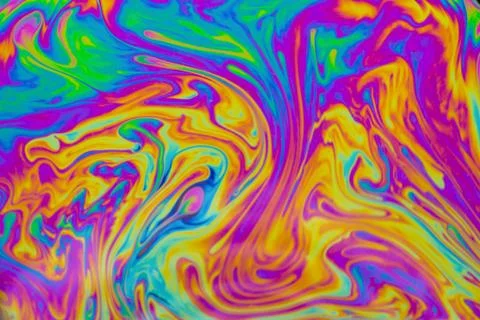 Psychedelic multicolored patterns background. Photo macro shot of soap bubble Stock Photos